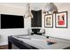 Modern game room with pool table, stylish seating, and a sleek entertainment setup for ultimate fun at 2721 Sanctuary Woods Ln, Raleigh, NC 27606