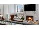 Inviting living room with a marble fireplace and comfortable furnishings at 2721 Sanctuary Woods Ln, Raleigh, NC 27606