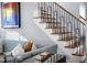 Living Room showcasing a modern staircase with stylish black railings and wood steps at 2721 Sanctuary Woods Ln, Raleigh, NC 27606