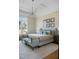 Comfortable main bedroom featuring a sitting area and large window providing natural light at 2721 Sanctuary Woods Ln, Raleigh, NC 27606
