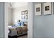 Spacious main bedroom featuring calming color palette, luxury bed, and tasteful decor at 2721 Sanctuary Woods Ln, Raleigh, NC 27606