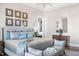 Comfortable main bedroom featuring a sitting area and ensuite bath at 2721 Sanctuary Woods Ln, Raleigh, NC 27606