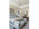 Comfortable main bedroom featuring a sitting area and ensuite bath at 2721 Sanctuary Woods Ln, Raleigh, NC 27606