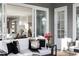 Sunroom features outdoor access, natural light, and comfortable seating at 2721 Sanctuary Woods Ln, Raleigh, NC 27606