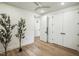 Light-filled bedroom with hardwood floors and closet at 29 Enterprise St # 309, Raleigh, NC 27607