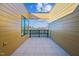 Spacious patio with modern railings offering views of the surrounding neighborhood at 29 Enterprise St # 309, Raleigh, NC 27607