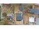 Aerial view of a newly constructed home with a gray roof and a small yard at 2917 State St, Durham, NC 27704
