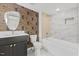 Modern bathroom with marble tile and stylish vanity at 2917 State St, Durham, NC 27704