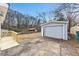 Detached garage with driveway and access to backyard at 2917 State St, Durham, NC 27704
