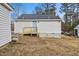 Side view of house with ramp and newly installed siding at 2917 State St, Durham, NC 27704