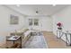 Living Room with beige sectional sofa and access to kitchen area at 2917 State St, Durham, NC 27704