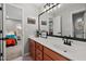 Bathroom with a single sink and a large framed mirror at 3020 Imperial Oaks Dr, Raleigh, NC 27614