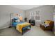 Cozy bedroom features carpet floors, natural light, and an accent chair at 3020 Imperial Oaks Dr, Raleigh, NC 27614