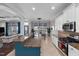 Open floorplan with stainless steel appliances, large island, and abundant natural light from large windows at 3020 Imperial Oaks Dr, Raleigh, NC 27614