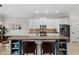 Kitchen featuring granite countertops, stainless steel appliances, and a center island with seating at 3020 Imperial Oaks Dr, Raleigh, NC 27614