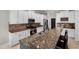 Kitchen with granite countertops, stainless steel appliances and a center island at 3020 Imperial Oaks Dr, Raleigh, NC 27614