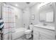 Full bathroom with a shower-tub combination and modern vanity at 315 E Fourth St, Wendell, NC 27591