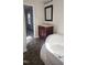 Bathroom with a soaking tub, dark vanity, and tile floor at 320 Eastfield Dr, Rocky Mount, NC 27801