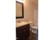 Clean bathroom with dark vanity, single sink, and shower/tub combo at 320 Eastfield Dr, Rocky Mount, NC 27801