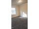 Spacious bedroom with carpet flooring and a window at 320 Eastfield Dr, Rocky Mount, NC 27801