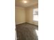 Bright bedroom with carpet flooring and window with blinds at 320 Eastfield Dr, Rocky Mount, NC 27801