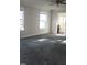Large main bedroom with carpet and en-suite bathroom at 320 Eastfield Dr, Rocky Mount, NC 27801