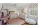 Bright bedroom with hardwood floors, a comfy bed, and ample closet space at 3305 Landor Road Rd, Raleigh, NC 27609