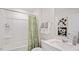 Clean bathroom with tub shower and white vanity at 3600 Sorda Ct, Raleigh, NC 27610