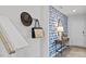 Stylish entryway with blue accent wall and built-in shelving at 3600 Sorda Ct, Raleigh, NC 27610