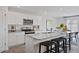 Modern kitchen with granite island and stainless steel appliances at 3600 Sorda Ct, Raleigh, NC 27610