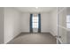 Simple office space with a window and carpeted floor at 3605 Sorda Ct, Raleigh, NC 27610