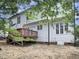 Exterior view of home featuring a deck overlooking the yard at 408 Froyle Ct, Rolesville, NC 27571