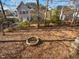 Large backyard with firepit and privacy fence at 408 Froyle Ct, Rolesville, NC 27571