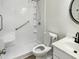 Walk-in shower in bathroom with grab bars and a new vanity with modern fixtures at 408 Froyle Ct, Rolesville, NC 27571