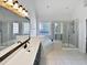 Elegant bathroom with a corner soaking tub and walk-in shower at 408 Froyle Ct, Rolesville, NC 27571