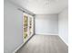 Spacious bedroom with carpeted floors and large window at 408 Froyle Ct, Rolesville, NC 27571