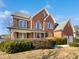 Brick two-story house with landscaping and a large front yard at 408 Froyle Ct, Rolesville, NC 27571