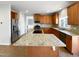 Modern kitchen with granite countertops and stainless steel appliances at 408 Froyle Ct, Rolesville, NC 27571