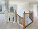 Elegant staircase with wood and iron railings leading to the upper level at 408 Froyle Ct, Rolesville, NC 27571