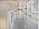 Large walk-in closet with ample shelving and hanging space at 408 Froyle Ct, Rolesville, NC 27571