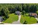 Aerial view of the house showcasing the long driveway and expansive, tree-lined backyard at 46 Trusting Ln, Middlesex, NC 27557