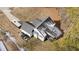 House with gray roof, screened porch, and a wooded backyard at 46 Trusting Ln, Middlesex, NC 27557