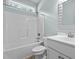 A clean bathroom with a tub/shower combination, a window, and a single vanity at 46 Trusting Ln, Middlesex, NC 27557