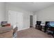 Spacious bedroom with double doors and carpet flooring at 46 Trusting Ln, Middlesex, NC 27557