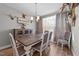 Dining room with rustic farmhouse table and view of the entryway at 46 Trusting Ln, Middlesex, NC 27557