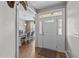 Bright entryway with hardwood floors and view into the dining room at 46 Trusting Ln, Middlesex, NC 27557