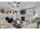 Relaxing living room featuring a fireplace and comfortable seating at 46 Trusting Ln, Middlesex, NC 27557