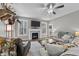 Living room with fireplace and plenty of natural light at 46 Trusting Ln, Middlesex, NC 27557