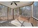 Relaxing screened porch overlooking a wooded backyard at 46 Trusting Ln, Middlesex, NC 27557