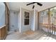 Screened porch with wood flooring and a view of the backyard at 46 Trusting Ln, Middlesex, NC 27557